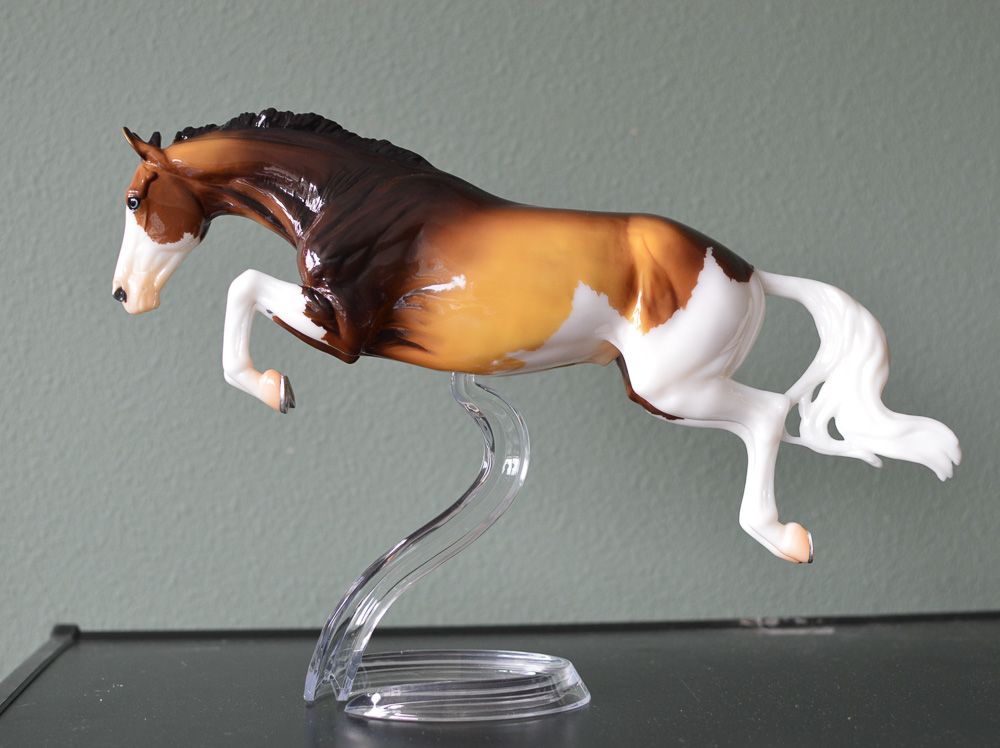 Jumping horse, Bristol, in Breyerfest special run buckskin with extensive white markings