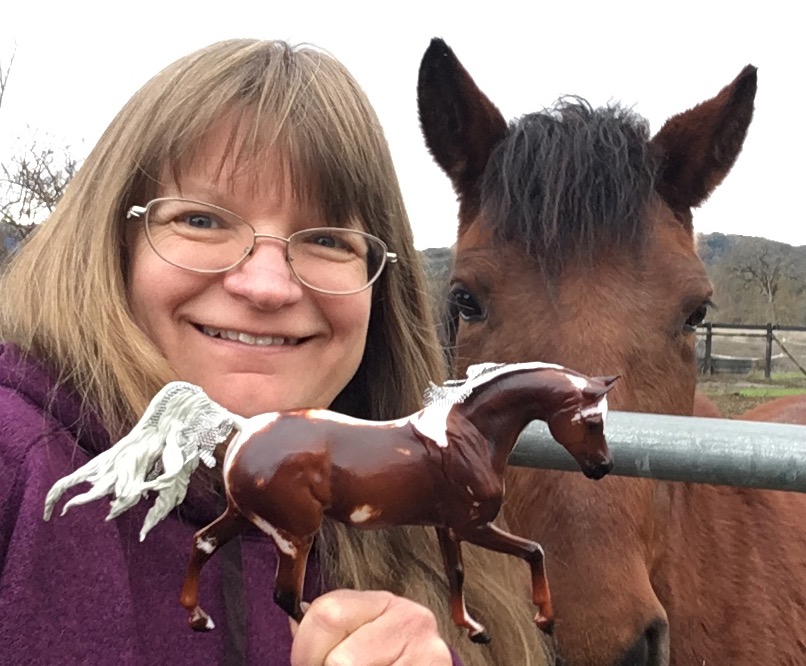 NaMoPaiMo selfie - Elaine with her bay pony, holding her NaMoPaiMo 2021 horse, a Malik with a resculpted mane and tail.