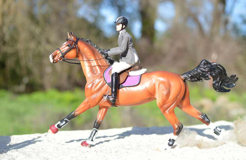 galloping bay model horse in jumper tack